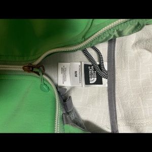 Green North Face full zip green jacket